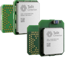 Two electronic circuit modules labeled Telit Cinterion, with model numbers WE310G4-P and WE310G4-I, featuring visible IMEI numbers and gold connector pins.